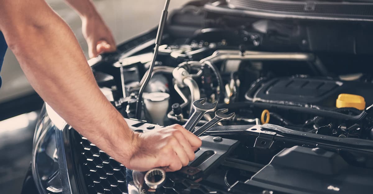 Mechanic working on a car